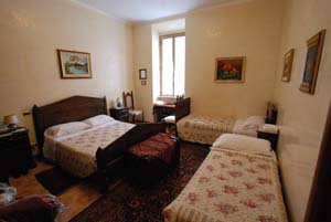 Family 1 room quad with private facilities (shower), and breakfast